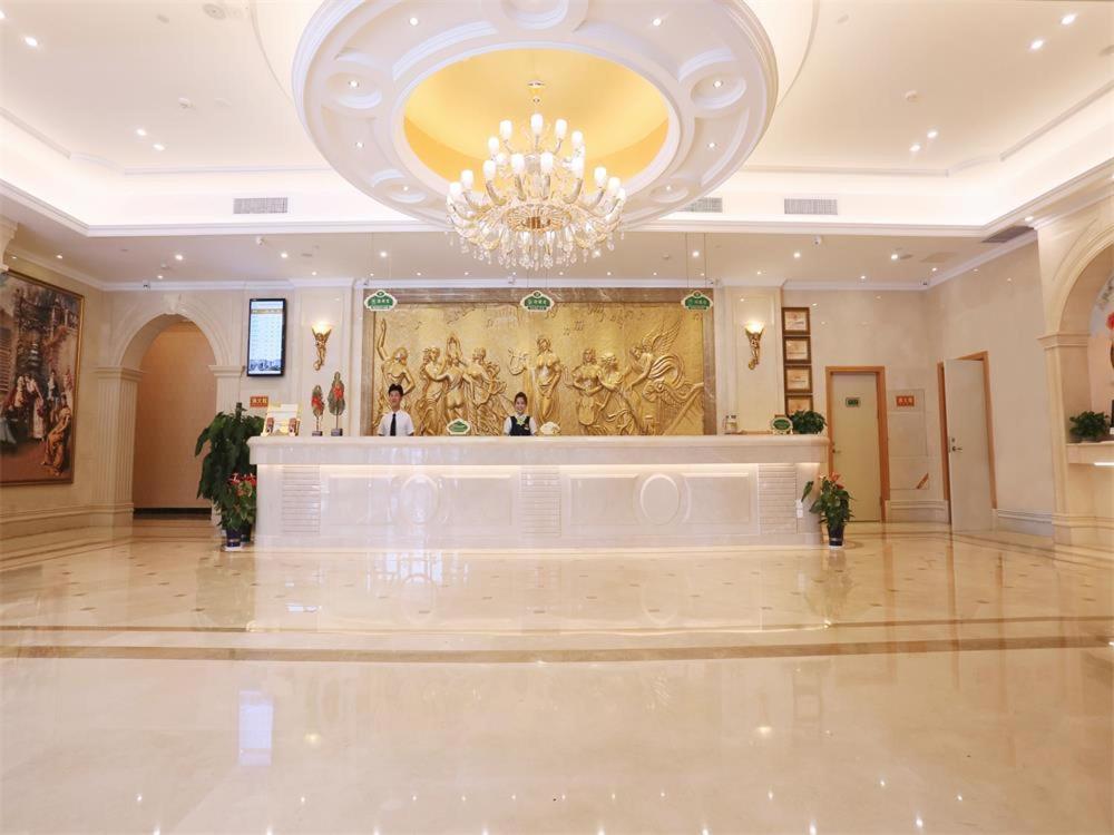 Vienna International Hotel Yantai Changjiang Road Xingyi Square Branch エクステリア 写真